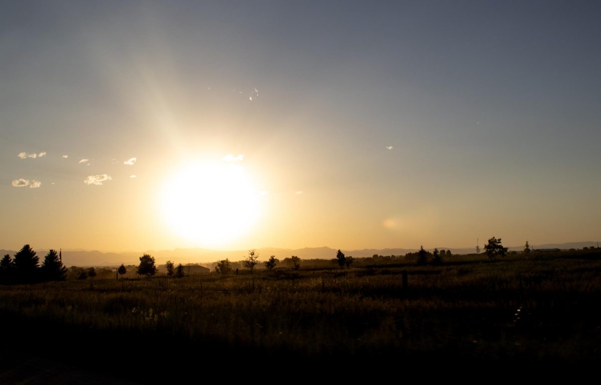 An evening sunset over a Colorado meadow.